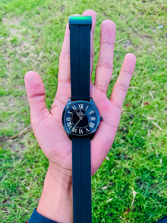 Elegance brand analog watch featuring a black dial and silicone Strap